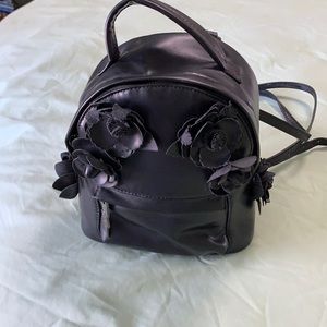 Black very mini Betsey Johnson backpack purse